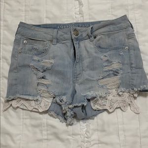 Distressed light wash denim shorts